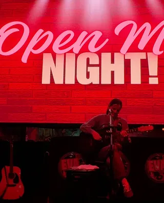 Open Mic at Eva bar & she's wearing my jeans